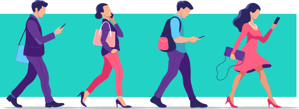 Personas caminando y usando dispositivos móviles.
